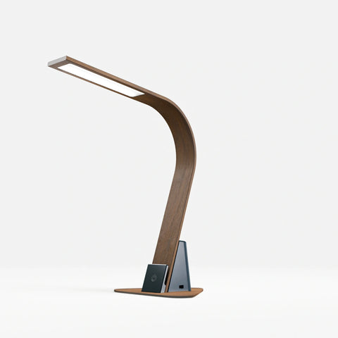 The Brooklyn USB LED Task Lamp in Black Walnut Finish with a stabilizing base, on a white background. The USB-C port is shown, along with the 12W Qi Wireless Charging Pad and Touch-Dimmable power button. The USB-A port is on the other side of the lamp.