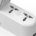 Close-up of the universal AC sockets on the Brooklyn AC LED Task Lamp, providing versatile power options for devices.
