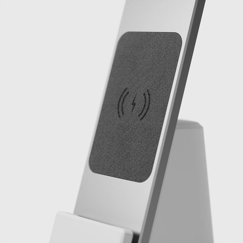 Close up of the Felt Charging Pad of the Brooklyn LED Task lamp, shown in Brushed Aluminum finish. 