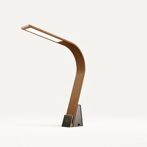 The modern wooden Brooklyn USB LED Task Lamp in Black Walnut finish, with USB charging on a white background
