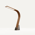 Brooklyn USB Task Lamp in Black Walnut Finish on a White Background. The Touch activated dimmer and USB ports are showing.