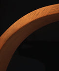 Close-up of the Brooklyn USB LED Task Light in Black Walnut Wood showing natural wood grain and smooth curved edges.
