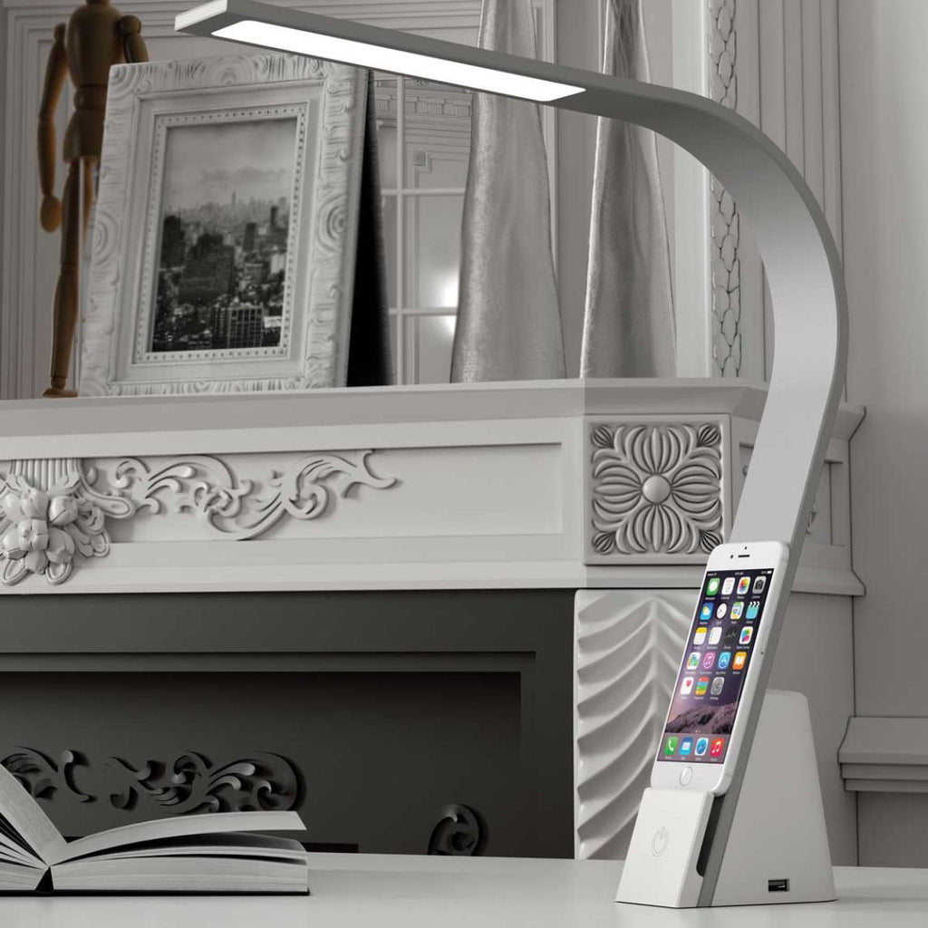 Brooklyn Aura - LED Task Light charging a smartphone on a modern desk