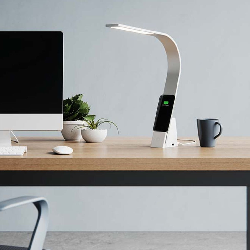 The Brookly Aura is a LED task lamp for desks and tables. It can charge a smartphone wirelessly with Qi compatible wireless charging.